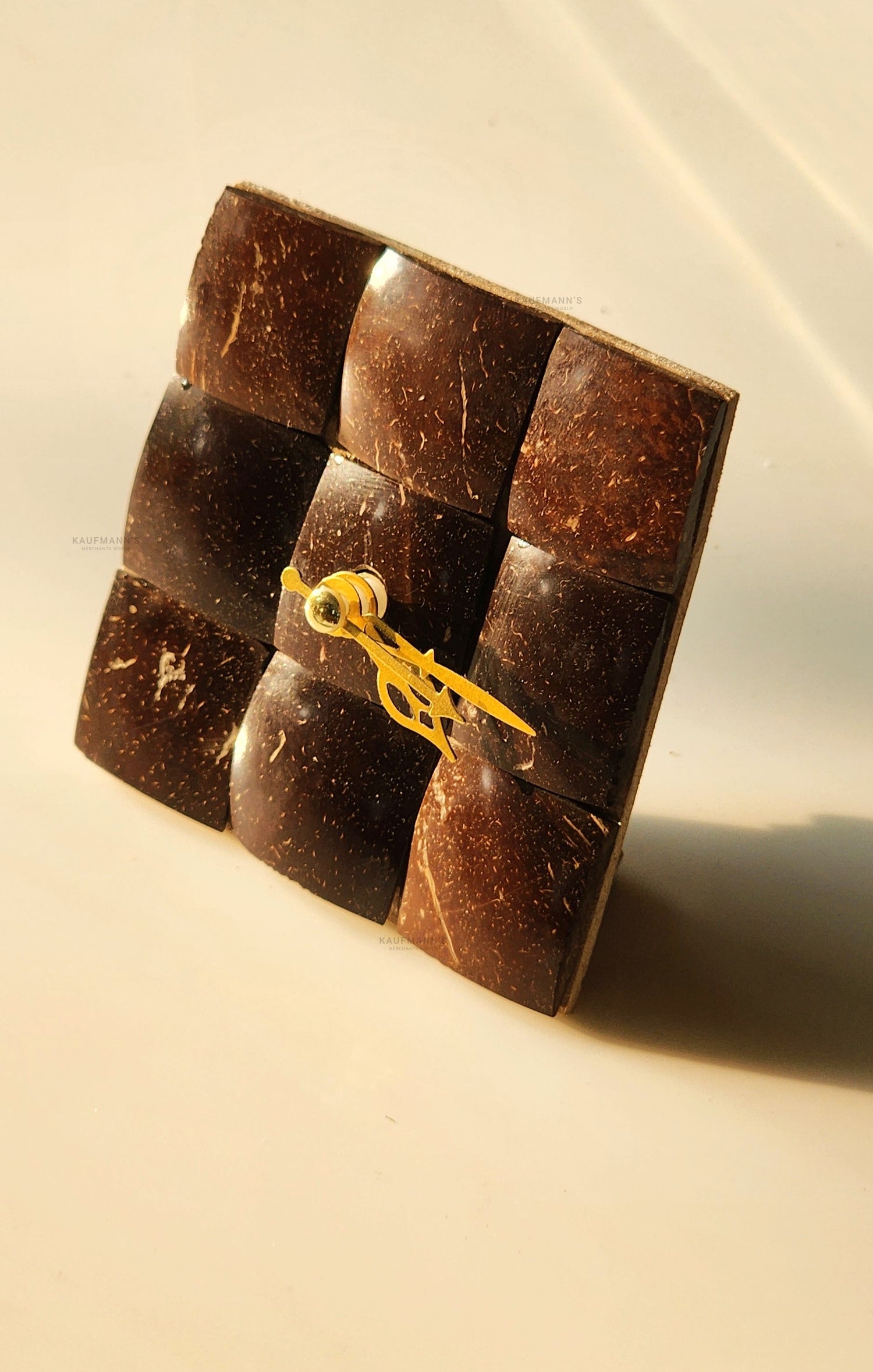 A cute little clock made with coconut shell 